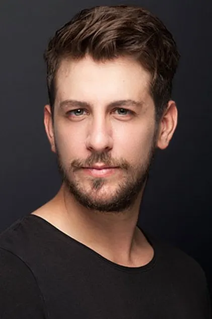 Birand Tunca as Emre Divit