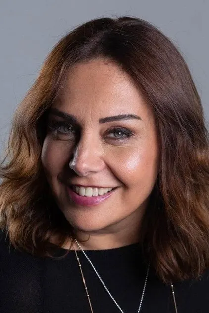 Çiçek Dilligil dans le rôle de Asuman Kutlu